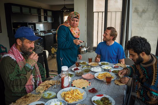 Barbecue potluck dinner for Christians and Muslims